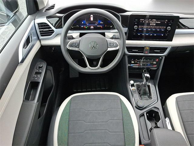 new 2025 Volkswagen Taos car, priced at $28,810