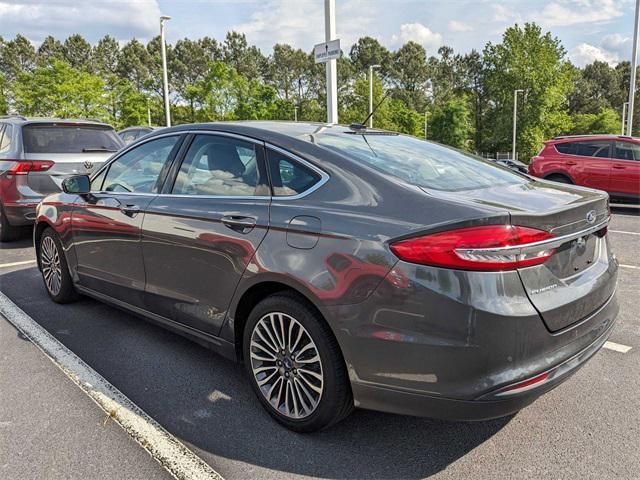 used 2018 Ford Fusion car, priced at $13,830