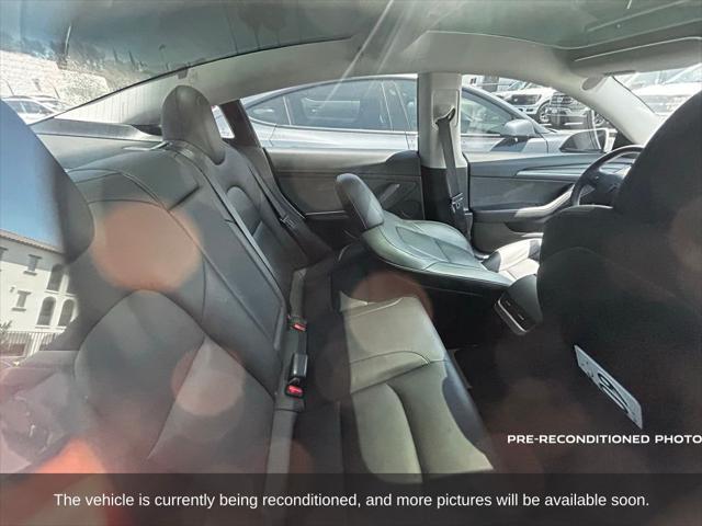 used 2023 Tesla Model 3 car, priced at $27,577