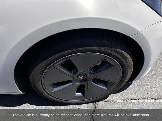 used 2023 Tesla Model 3 car, priced at $27,577