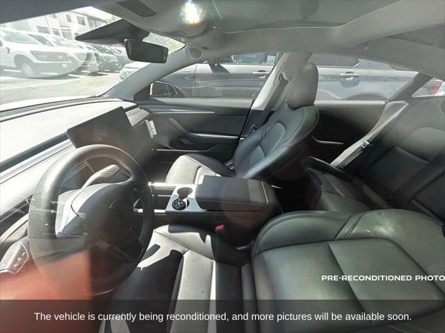 used 2023 Tesla Model 3 car, priced at $27,577