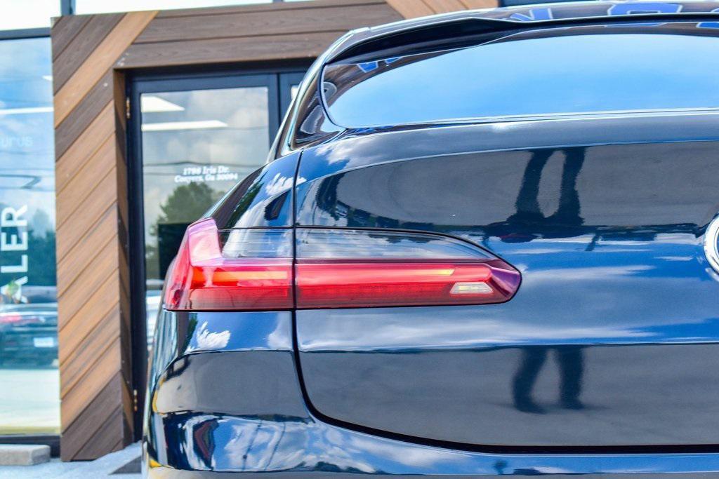 used 2022 BMW X4 car, priced at $32,950