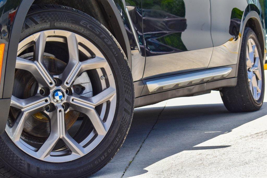 used 2022 BMW X4 car, priced at $32,950
