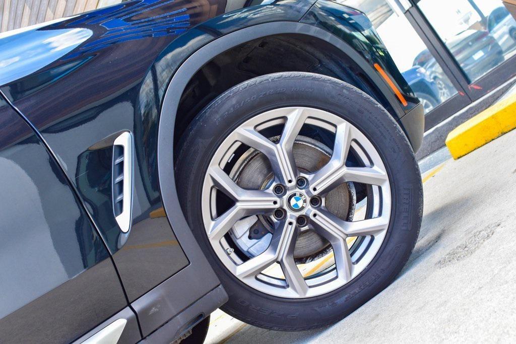 used 2022 BMW X4 car, priced at $32,950
