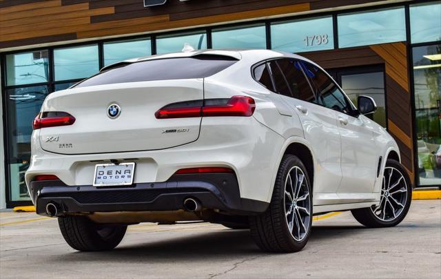 used 2021 BMW X4 car, priced at $26,730