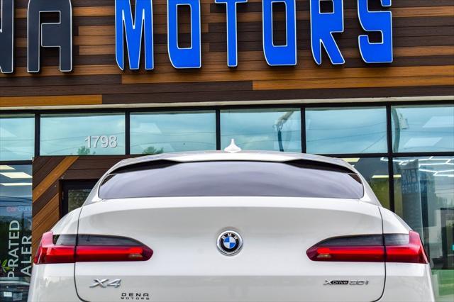 used 2021 BMW X4 car, priced at $26,730