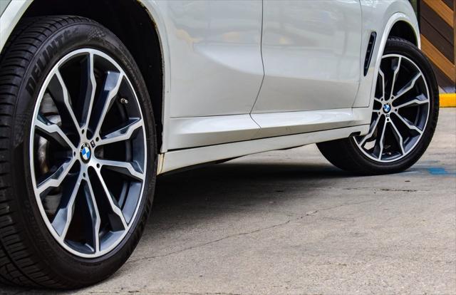 used 2021 BMW X4 car, priced at $26,730
