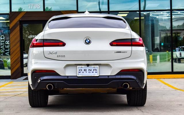 used 2021 BMW X4 car, priced at $26,730