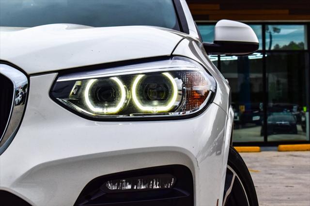 used 2021 BMW X4 car, priced at $26,730