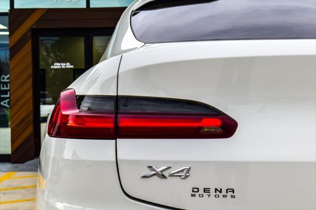 used 2021 BMW X4 car, priced at $26,730