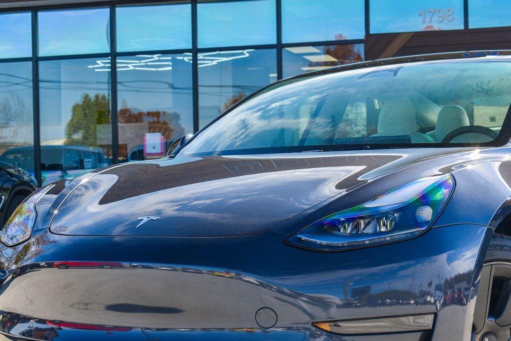 used 2022 Tesla Model 3 car, priced at $25,647