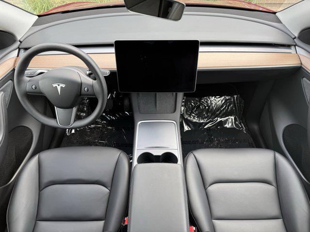 used 2025 Tesla Model Y car, priced at $36,900