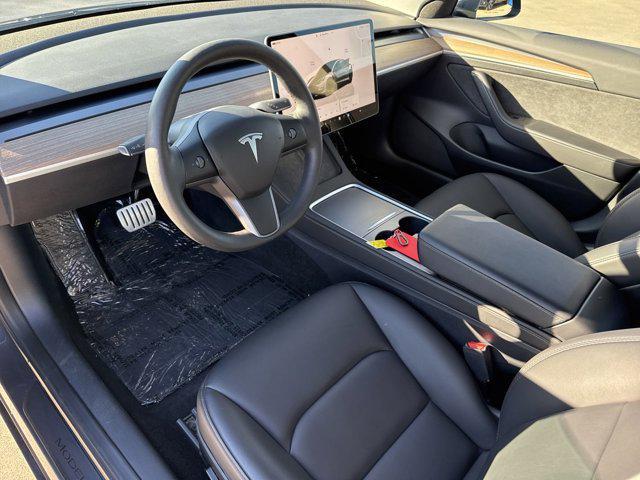 used 2023 Tesla Model 3 car, priced at $28,990