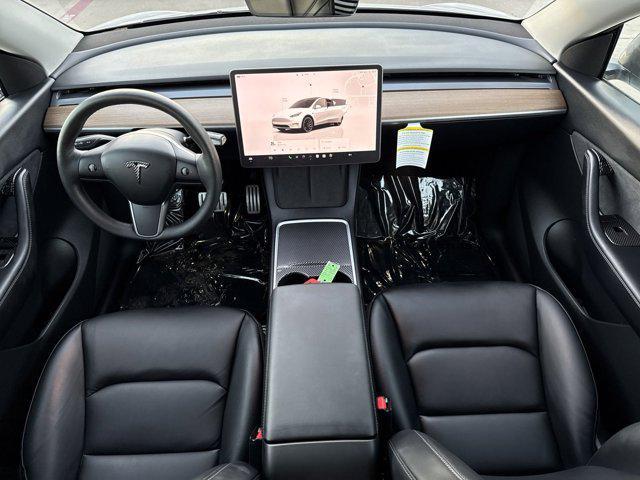 used 2022 Tesla Model Y car, priced at $31,900