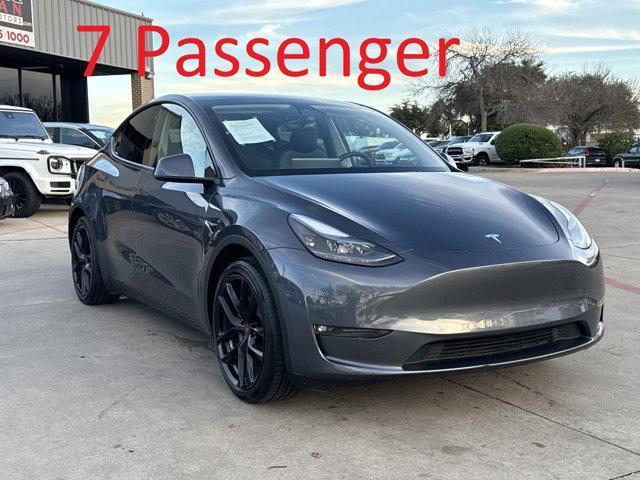 used 2023 Tesla Model Y car, priced at $30,900