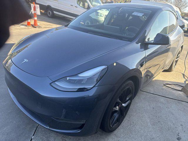 used 2023 Tesla Model Y car, priced at $30,400