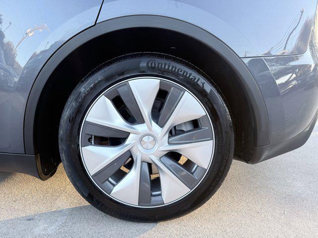 used 2023 Tesla Model Y car, priced at $27,900