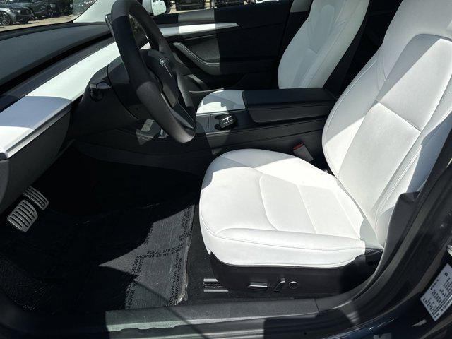 used 2022 Tesla Model 3 car, priced at $27,999