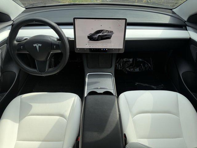 used 2023 Tesla Model 3 car, priced at $26,999