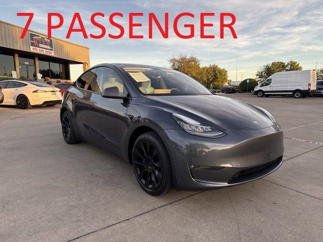 used 2023 Tesla Model Y car, priced at $30,900