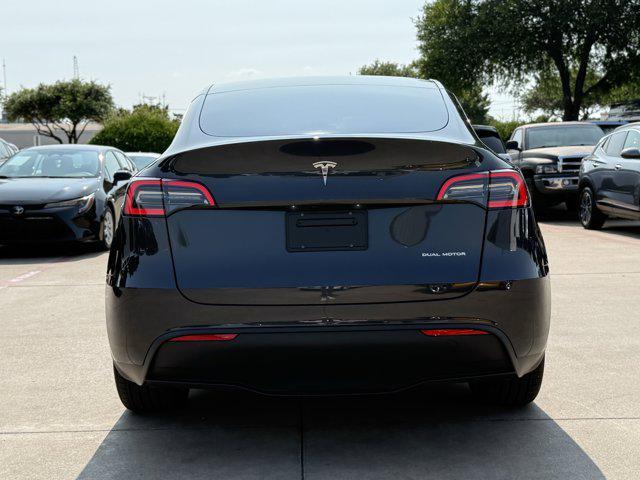 used 2024 Tesla Model Y car, priced at $33,290