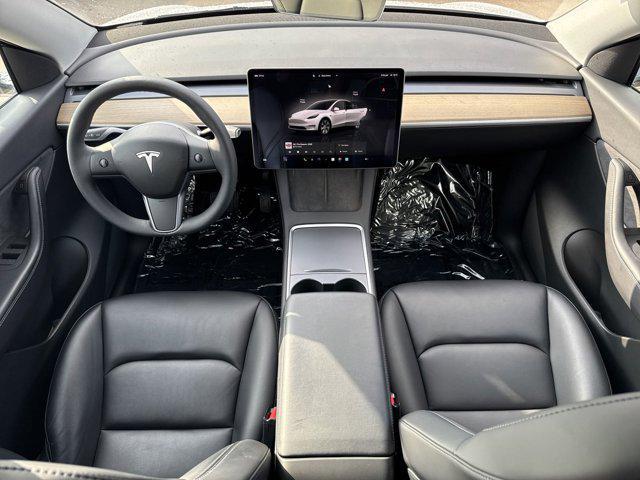 used 2022 Tesla Model Y car, priced at $26,999