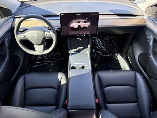 used 2023 Tesla Model Y car, priced at $28,999