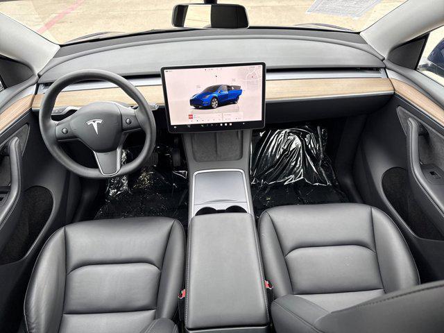 used 2023 Tesla Model Y car, priced at $31,400