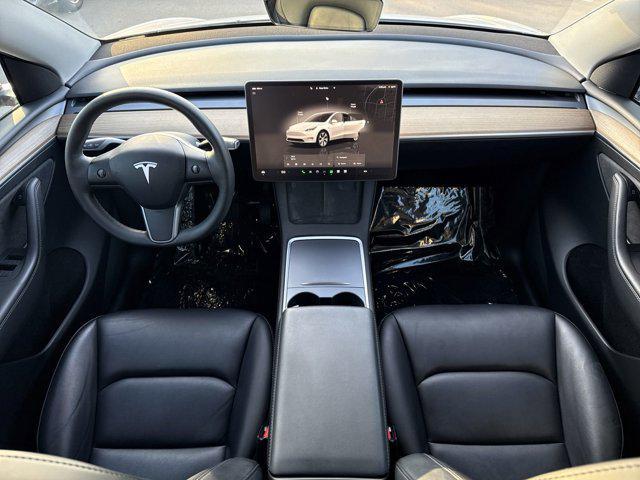 used 2023 Tesla Model Y car, priced at $30,900