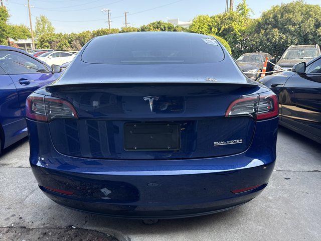 used 2023 Tesla Model 3 car, priced at $28,990