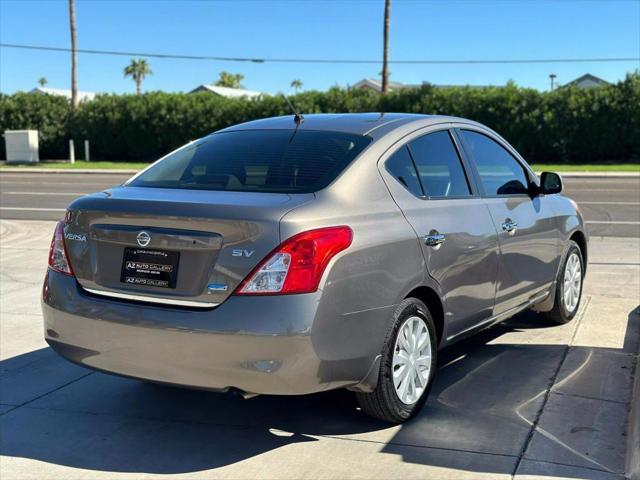 used 2012 Nissan Versa car, priced at $7,495