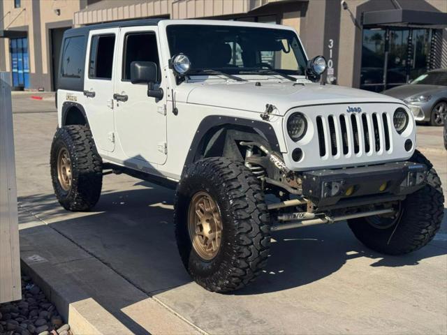 used 2012 Jeep Wrangler Unlimited car, priced at $19,995