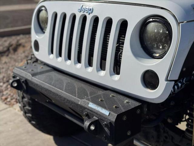 used 2012 Jeep Wrangler Unlimited car, priced at $19,995