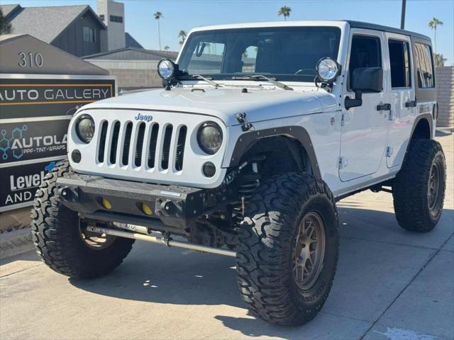 used 2012 Jeep Wrangler Unlimited car, priced at $19,995