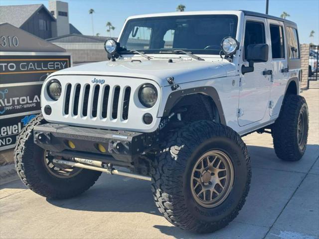 used 2012 Jeep Wrangler Unlimited car, priced at $19,995