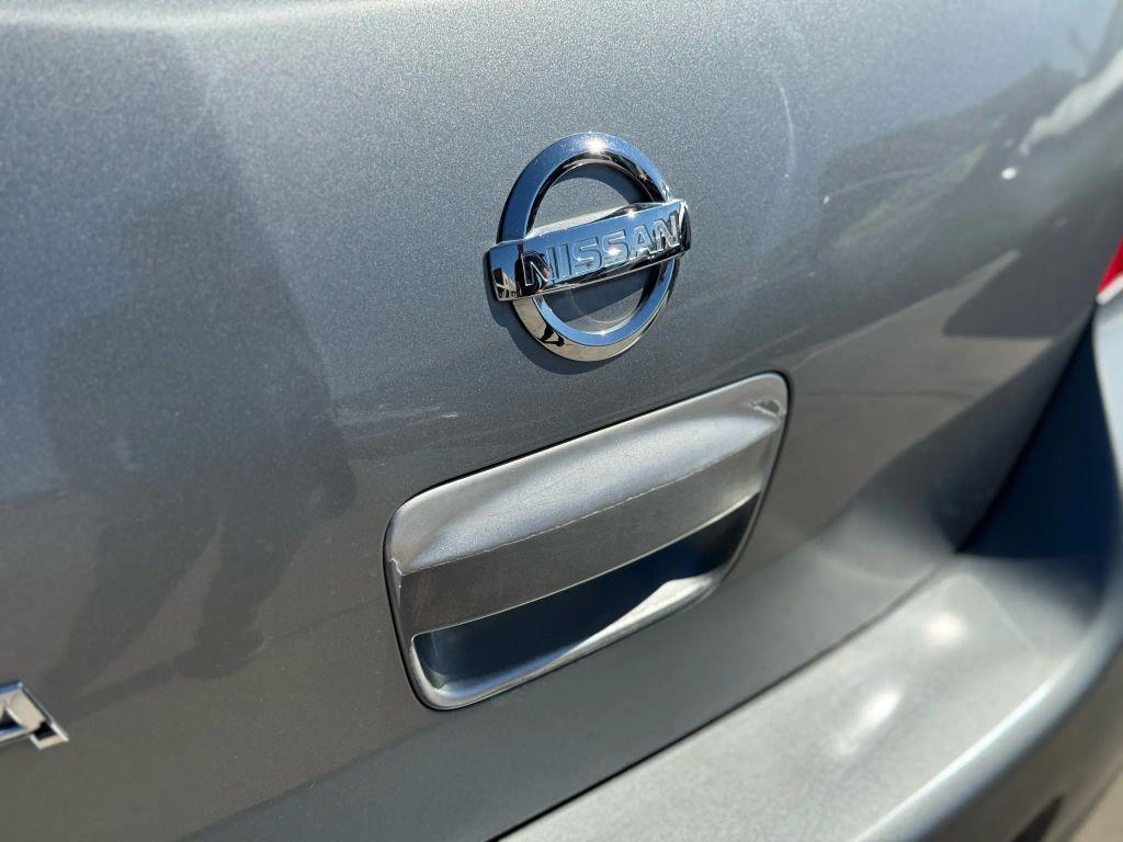 used 2010 Nissan Versa car, priced at $3,445