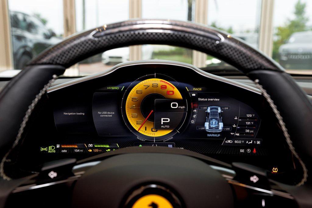 used 2024 Ferrari 296 GTS car, priced at $414,895