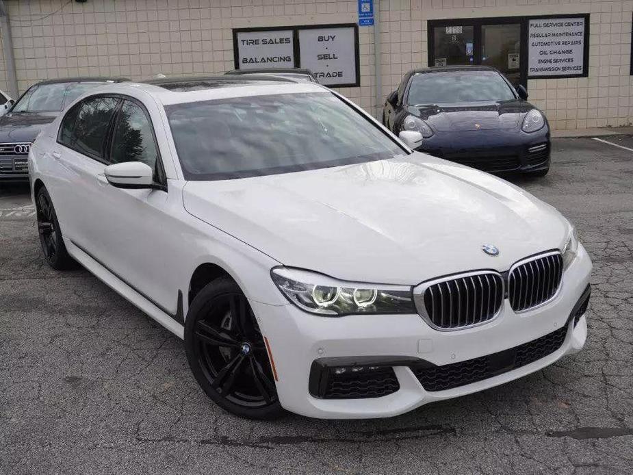 used 2016 BMW 740 car, priced at $25,900