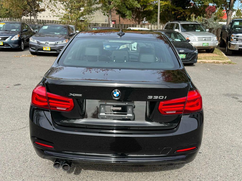 used 2018 BMW 330 car, priced at $13,999