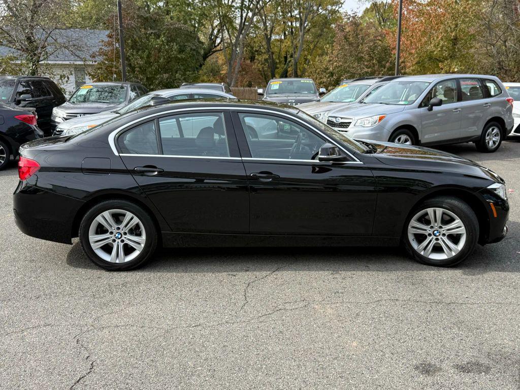 used 2018 BMW 330 car, priced at $13,999