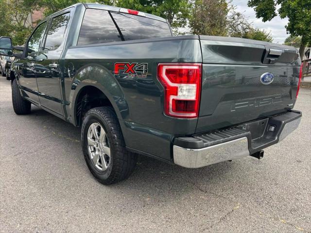 used 2018 Ford F-150 car, priced at $23,999