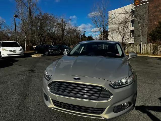 used 2015 Ford Fusion car, priced at $10,299