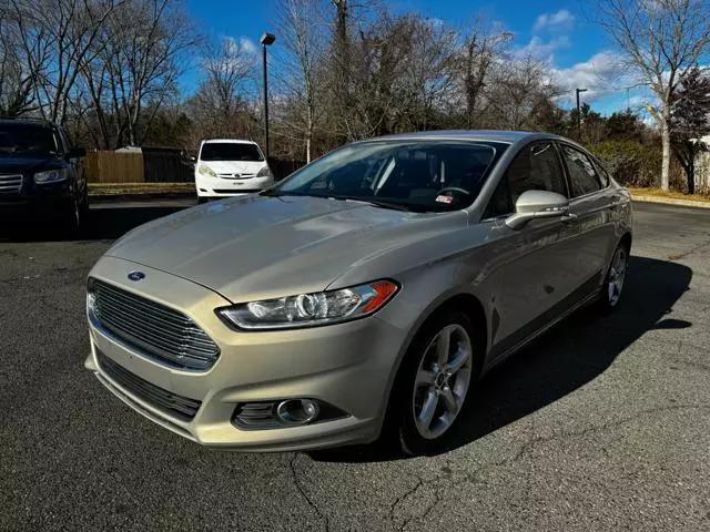 used 2015 Ford Fusion car, priced at $10,299