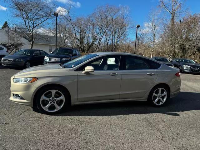 used 2015 Ford Fusion car, priced at $10,299