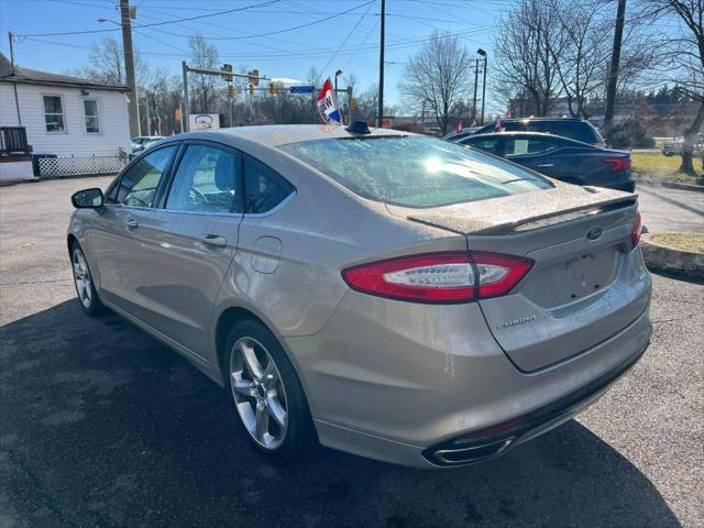 used 2015 Ford Fusion car, priced at $10,299