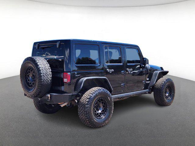 used 2011 Jeep Wrangler Unlimited car, priced at $13,689