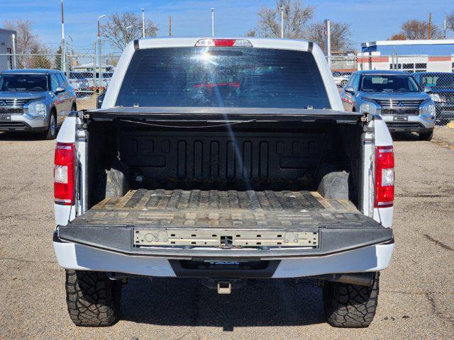 used 2018 Ford F-150 car, priced at $23,559