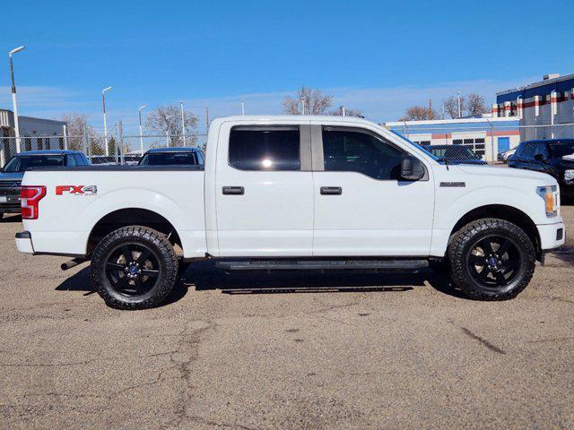 used 2018 Ford F-150 car, priced at $23,559