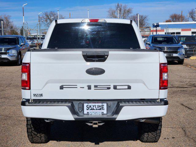 used 2018 Ford F-150 car, priced at $23,559