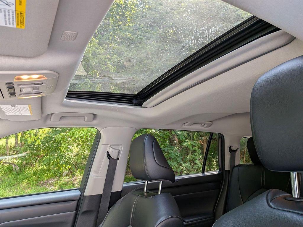 used 2022 Toyota Highlander car, priced at $34,498
